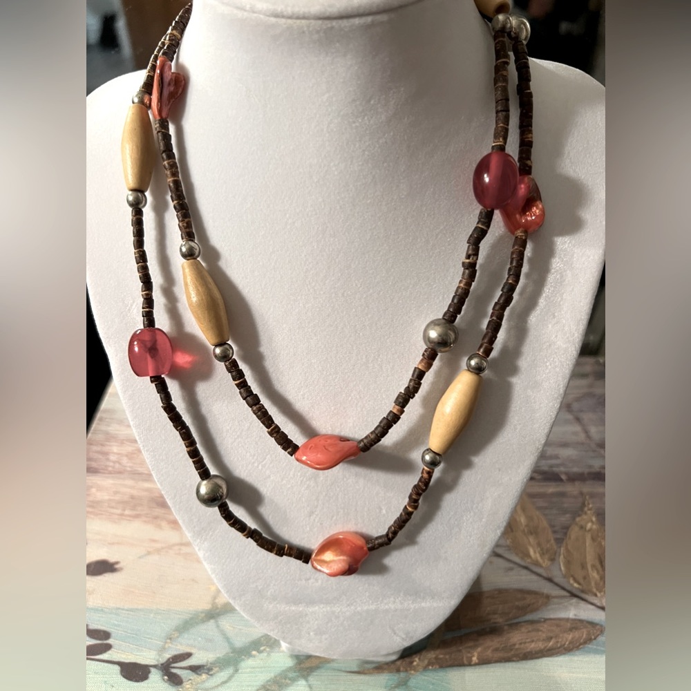 Costume jewelry brown and pink beads. Long necklace shown doubled up in picture